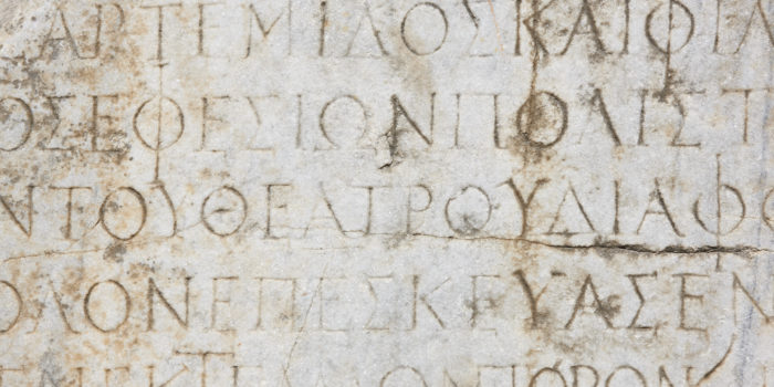 Ancient greek text marble carving. Ephesus excavation site. Turkey